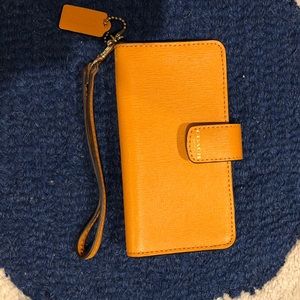 Coach wristlet wallet in mustard yellow